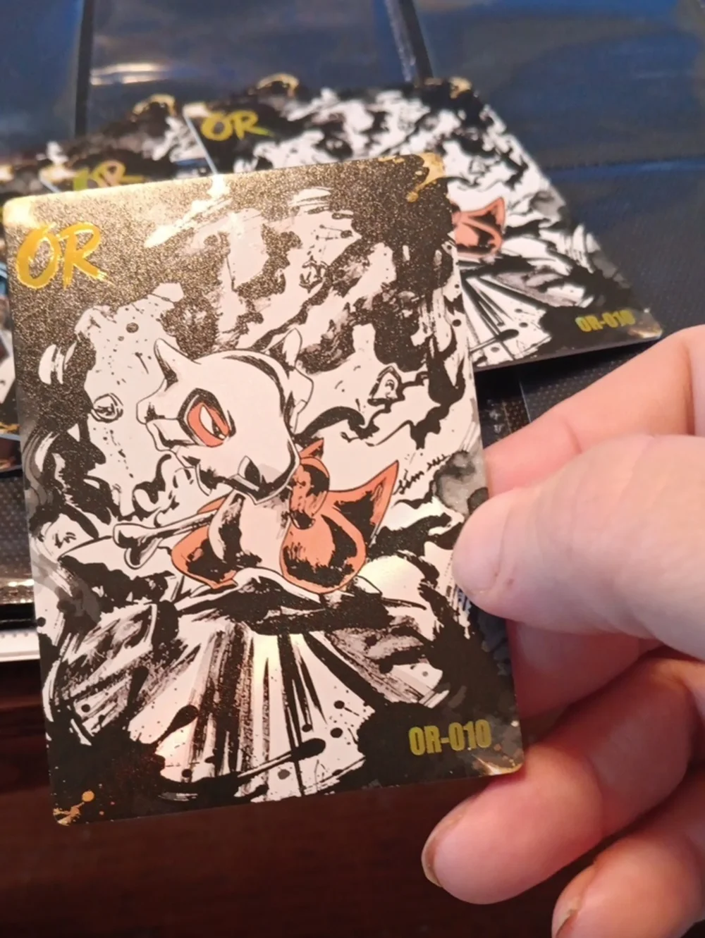 Pokemon Trading Card Black White Gold with Red Accent